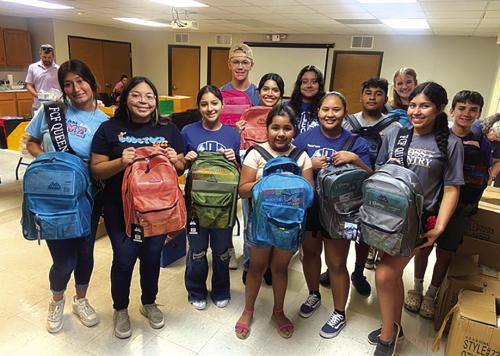 Leo Club Fills Backpacks for Back 2 School Fest
