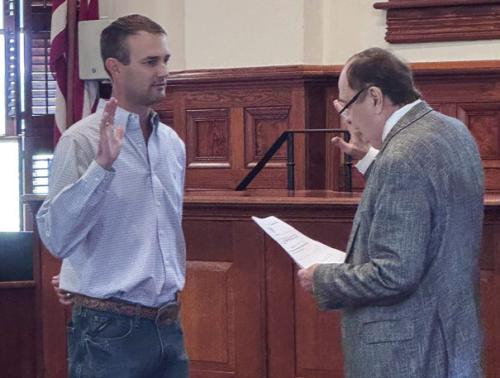 County Judge Dan Mueller (right) delivered the oath of office to the newly-appointed Pct. 2 Commissioner, Clint Sternadel, on Friday morning, May 2. Mueller appointed Clint Sternadel to replace his father Luke Sternadel, who retired from the County at the end of April.
