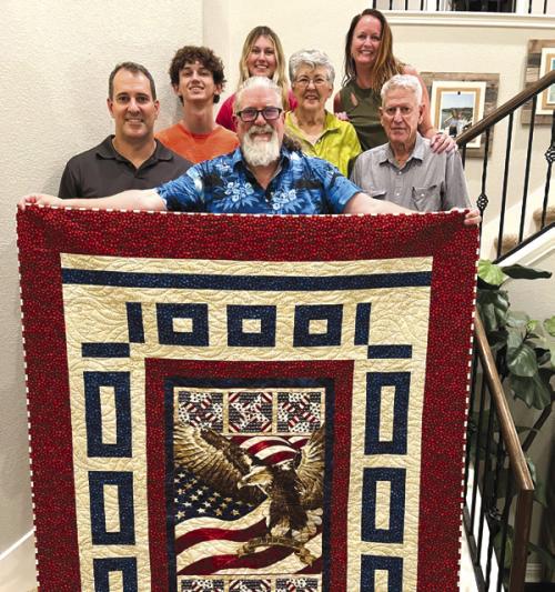 The Colorado Valley Quilt Guild presented a Quilt of Valor to James Hill of Abilene. He is a graduate of La Grange ISD. James served in the 3rd Armored Division, HHC 38th Cav in Germany. They were dispatched to Desert Shield Desert Storm. Afterwards he served at Fort Lewis, Tacoma, Washington. James is the son of Orvel and Jo Anne Hill of La Grange. Brother, Brent Hill and family also celebrated with James in receiving the Quilt of Valor.