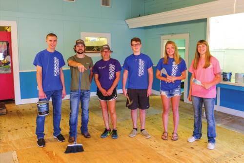 A group of senior Fayetteville High School students in the school’s work-study made some good memories working at Orsak’s Cafe in Fayetteville while school has been out for the coronavirus. Part of their work involved remodeling one of the restaurant’s dining rooms. Pictured (from left) are Dustin Canik, Gage Briggs, restaurant owner Terri McPherson, Braden Kubala, Sydney Knight and Amber Canik. Photo by Andy Behlen