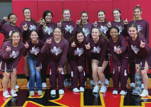 The Flatonia volleyball team celebrates after Monday’s playoff victory.