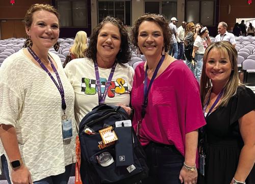 Roxanne Johnson, a fourth grade teacher at La Grange elementary, was selected as the LGISD Whataburger Teacher of the Year during an end-of-year ceremony last week at the La Grange Performing Arts Center. Johnson, second from left is shown here with La Grange elementary administration: Elementary Principal Regina Walker (left), Elementary Assistant Principal Ramona Glisson (second from right) and Elementary Assistant Principal Amanda Gommert (right).