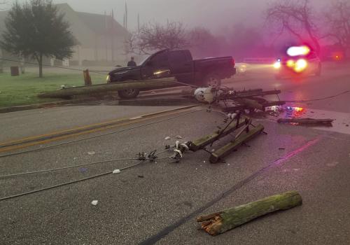 A pickup truck struck a power pole in front of Fayette Public Library in La Grange Tuesday morning, Jan. 17. The driver reported losing control after his front wheel bearings failed. Photo courtesy of the La Grange Volunteer FIre Department