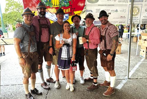 Downtown La Grange was filled with the sights, sounds, smells and tastes of Europe as The Rotary Club of La Grange hosted their Oktoberfest on the Square Saturday. Attendees were able to sample more than 60 varieties of craft beer under a pair of tents, listen to live bands, and feast on schnitzel, sausage and German noodles to complete an authentic Oktoberfest experience. Some attendees really got into the spirit of the event by dressing the part, above. Photo courtesy of Jonathan Hernandez