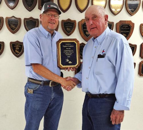 Pictured is Fayette County Vice President Steven Harker (left) and Eugene Niemeyer (right).