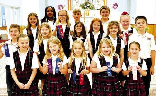 Grades 1-4, front from left: Addison Johnson, Emileigh Divin, Ellie Klein, Claire McCourt, Ree Lichnovsky; second row: Brody Lewis, Brylee Stoever, Emma Zweschper, Rowan Heinrich, Lane Schiffli, Micah Garcia; back row: Brielle Goedrich, Penelope Bartek, Jack Schiffli, Noah Heger, Abigale McBride.