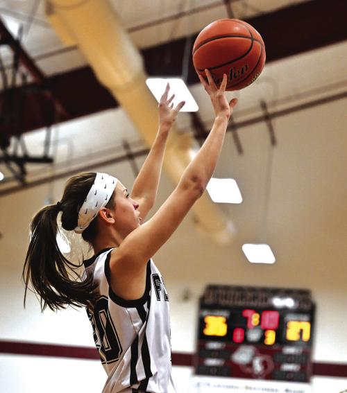 Danielle Vinklarek sinks it for the Flatonia Lady Bulldogs in Tuesday’s 41-39 district opener win over Ganado. Photo by Stephanie Steinhauser