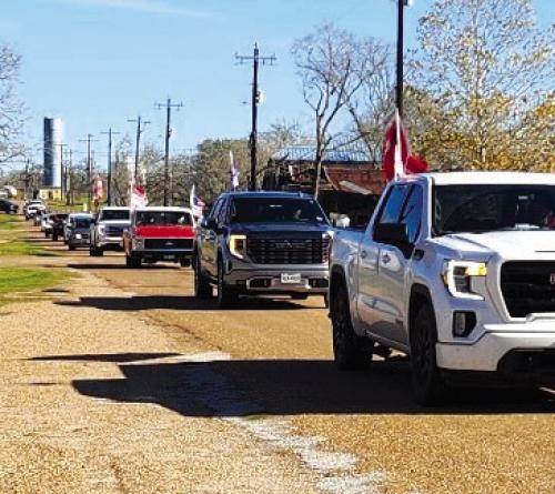 A “Trump Train” celebrating President Donald Trump’s upcoming inauguration came through Ellinger on Saturday, Jan. 11. Shown here is the line of cars that came down Grover Street as the train made it’s way across the county.