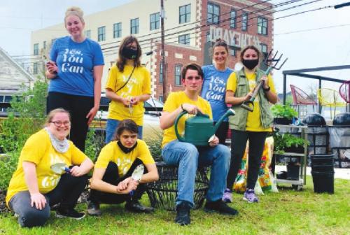 Pictured standing from left is: Amber Treybig, Joelle Mihalovich-Williams, Erin Wotipka, and Mary Wellborn; kneeling/sitting is: Shayleigh Staal, Jessica Shank, and Grant Woodward.