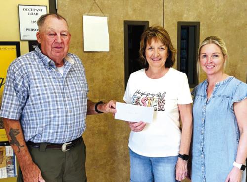 Presley’s Power recently accepted a donation from Hermann Sons Life-Plum. Pictured are Wilbert Hoffmann, Jackie Wessels, and Marlana Wessels.