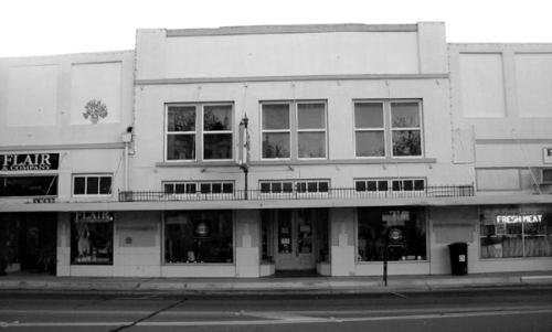 This 2010 photograph by Kathy Carter shows the three buildings on Travis Street that once made up the Von Rosenberg Company. Photo courtesy of the Fayette Heritage Museum &amp; Archives
