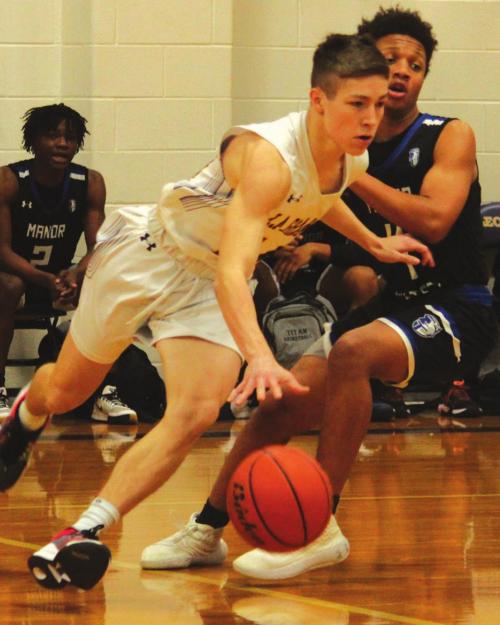 La Grange’s Clayton Knapik drives past a Manor New Tech defender in Friday’s game. Photo by Jeff Wick