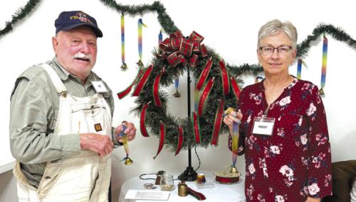 Recently at Senior Connections we had a discussion about holiday traditions and how those traditions change when we lose a loved one. We talked about how we can honor them and keep them present during the holidays. We ended this discussion signing our loved ones names to a bell and ringing it in unison remembering that whenever a bell rings an angel gets its wings. Pictured here is Jim Walker and Peggy Hiatt.