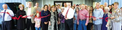 The ribbon-cutting at last week’s event was done by John Belvill. Photos by Andy Behlen