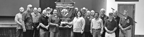 The Knights of Columbus presented $210 dollars to La Grange ISD for yearbooks for elementary, middle, and high school. Accepting the donation is Lucy Carr from Grand Knight Hector Cervantez.